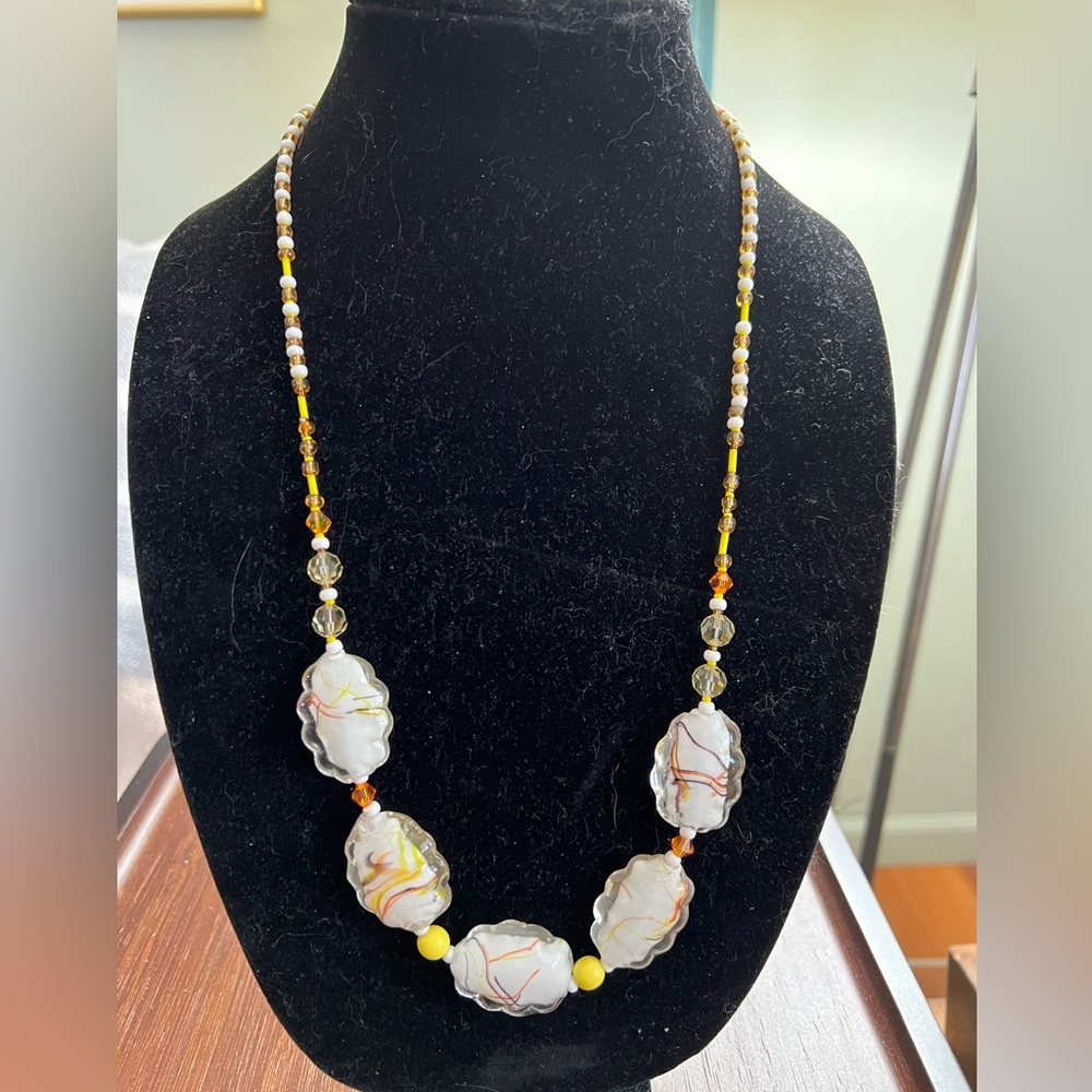 Vintage necklace featuring art glass beads, faceted glass beads and acrylic bead